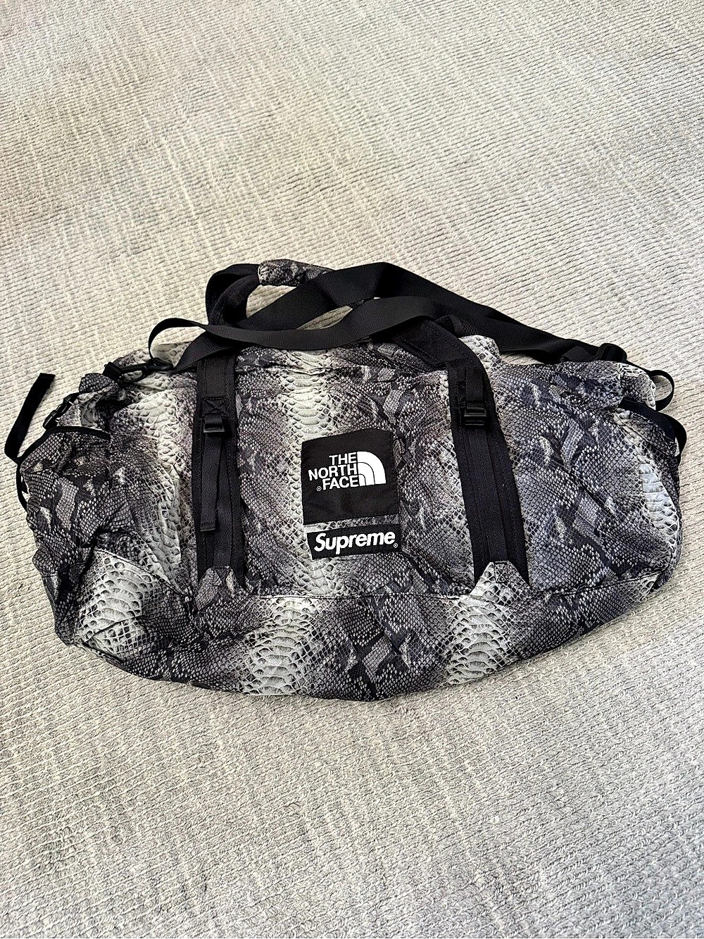 The North Face x Supreme Snake Print Duffel Bag Black & Gray